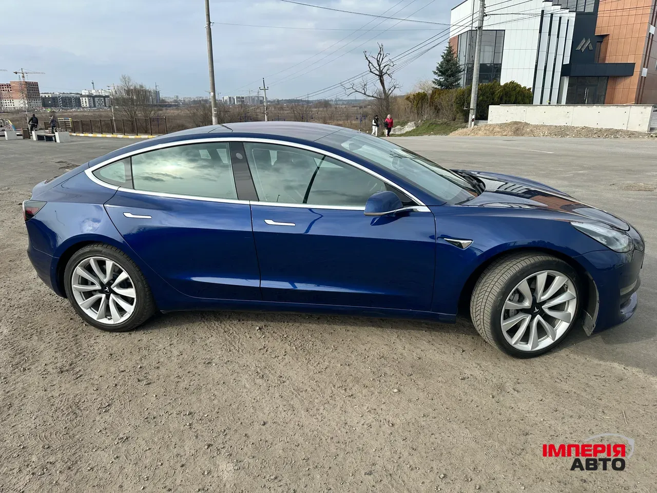 Tesla Model 3 - фото 8