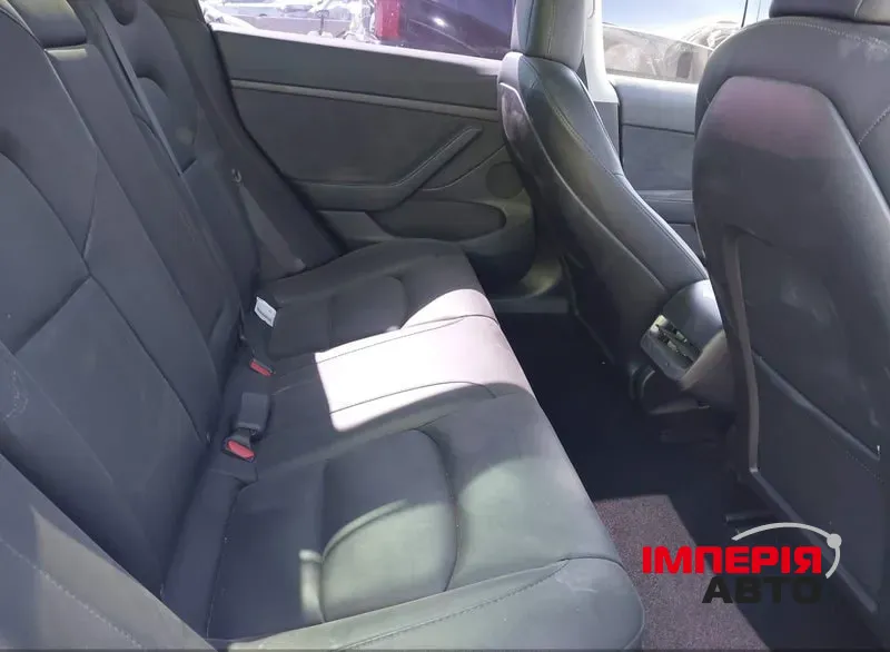 Tesla Model 3 - фото 11