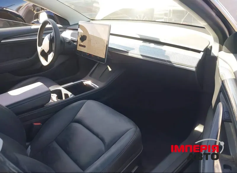 Tesla Model 3 - фото 9