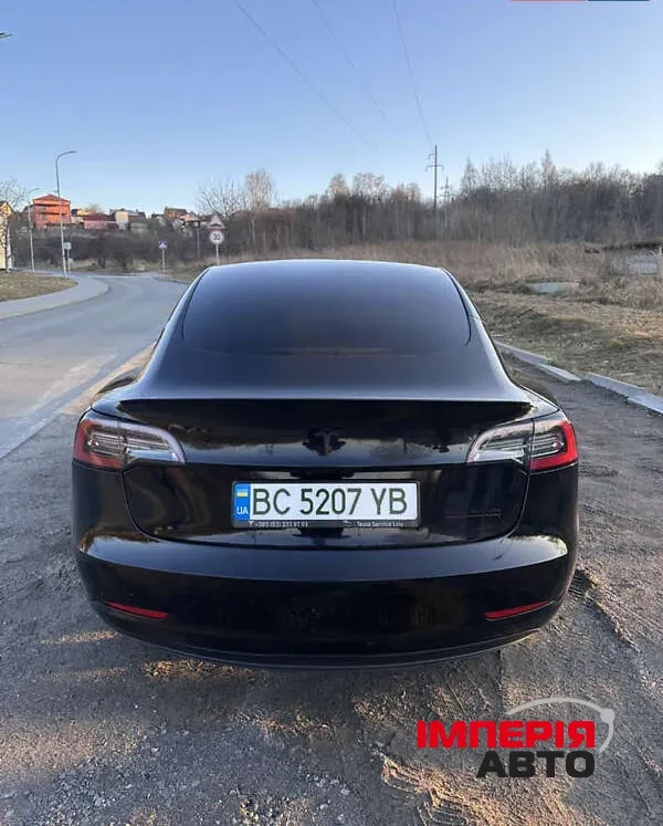 Tesla Model 3 - фото 7