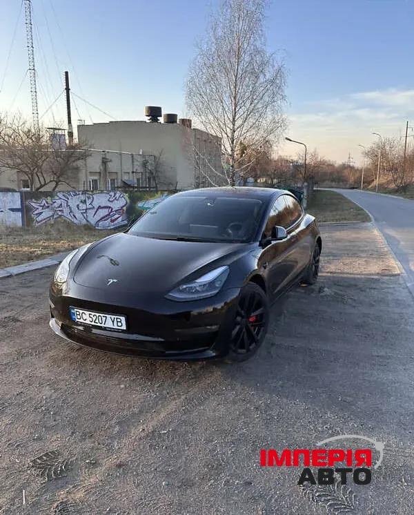 Tesla Model 3 - фото 4