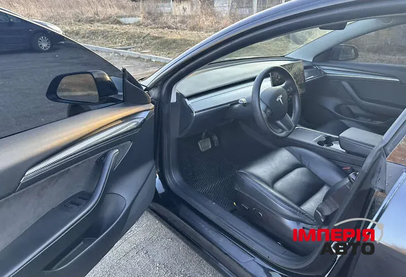 Tesla Model 3 - фото 8