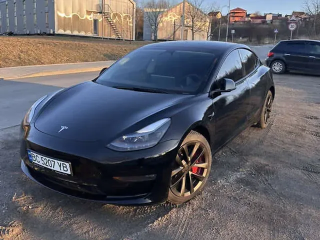 Tesla Model 3 - фото 1