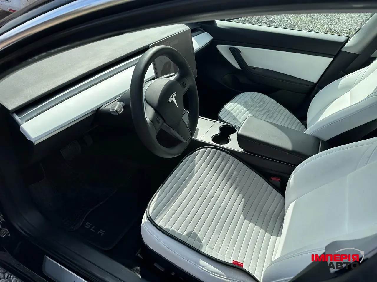 Tesla Model 3 - фото 7