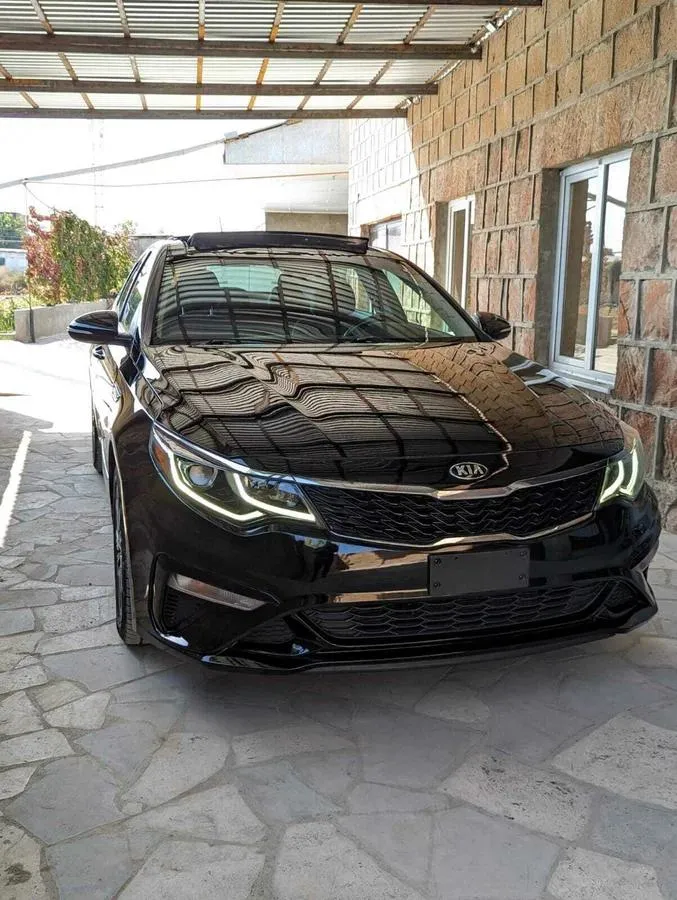 Kia Optima - фото 3