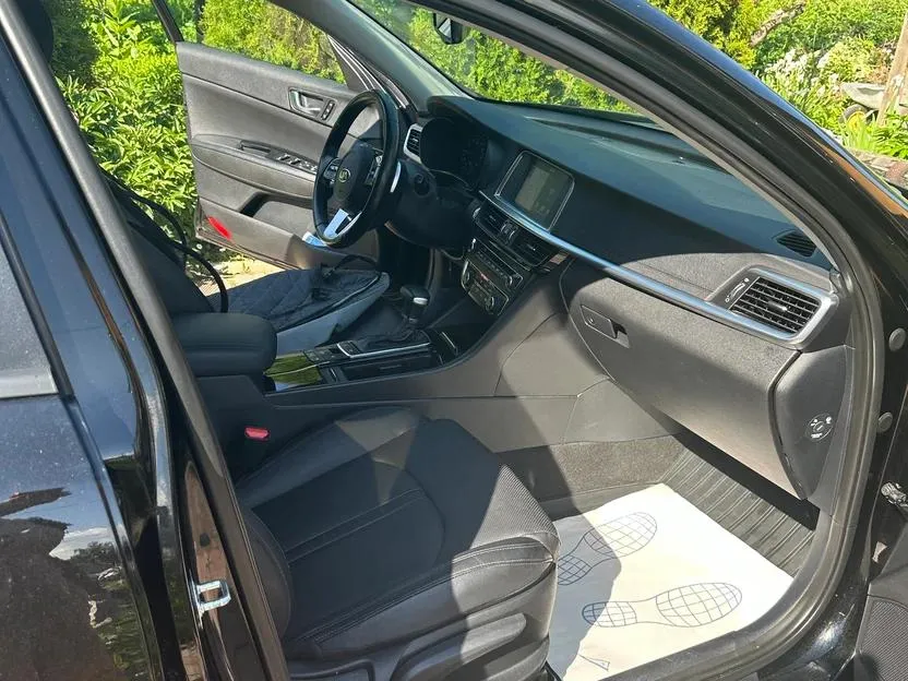 Kia Optima - фото 10