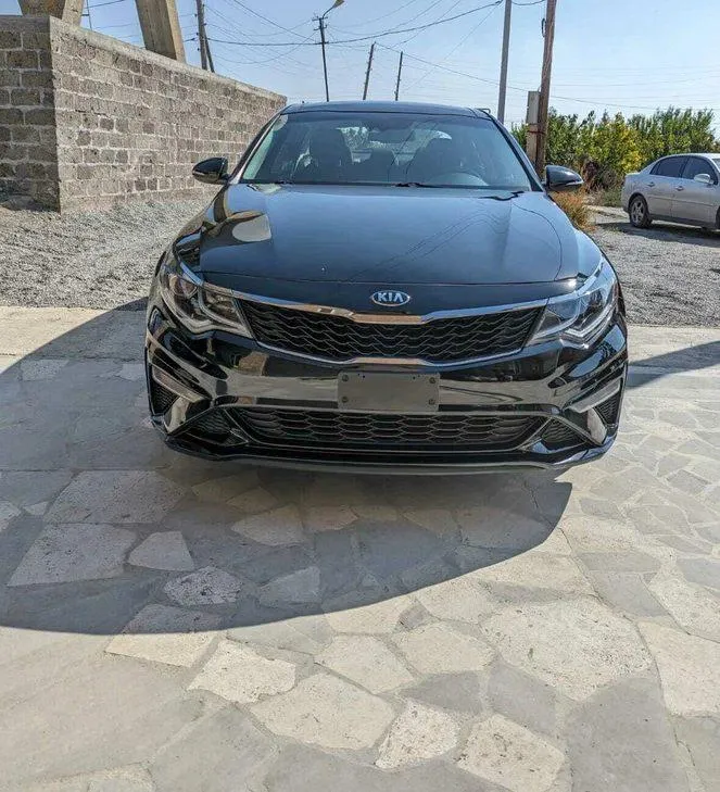 Kia Optima - фото 2
