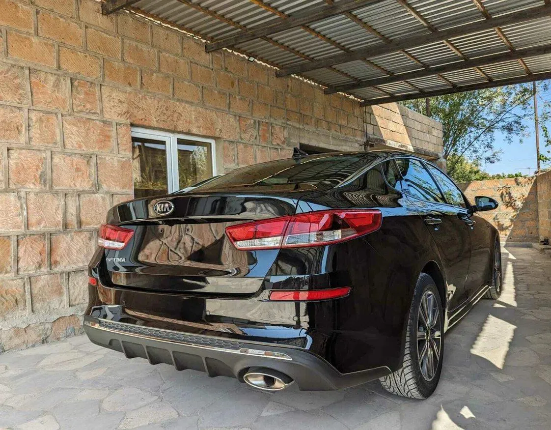 Kia Optima - фото 4