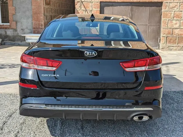Kia Optima - фото 5