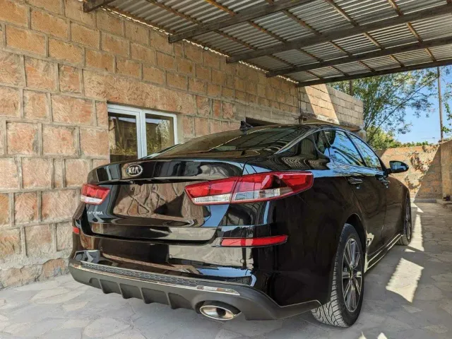 Kia Optima - фото 4