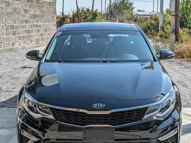 Kia Optima - фото 1