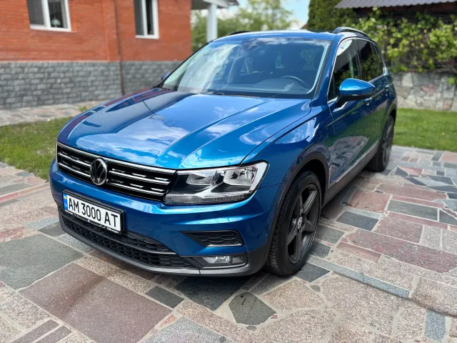 Volkswagen Tiguan - фото 1