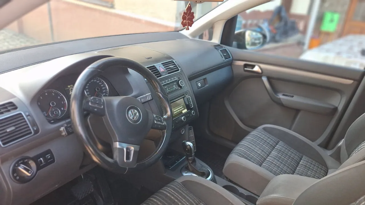 Volkswagen Touran - фото 10