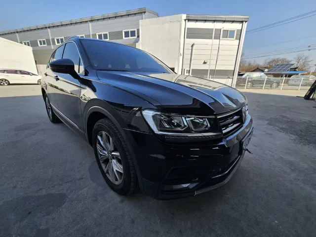 Volkswagen Tiguan - фото 1
