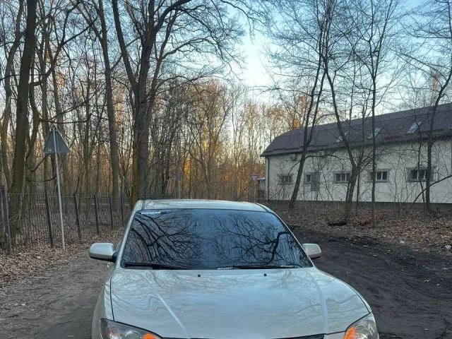 Mazda 3 - фото 1
