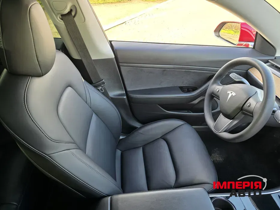 Tesla Model 3 - фото 10