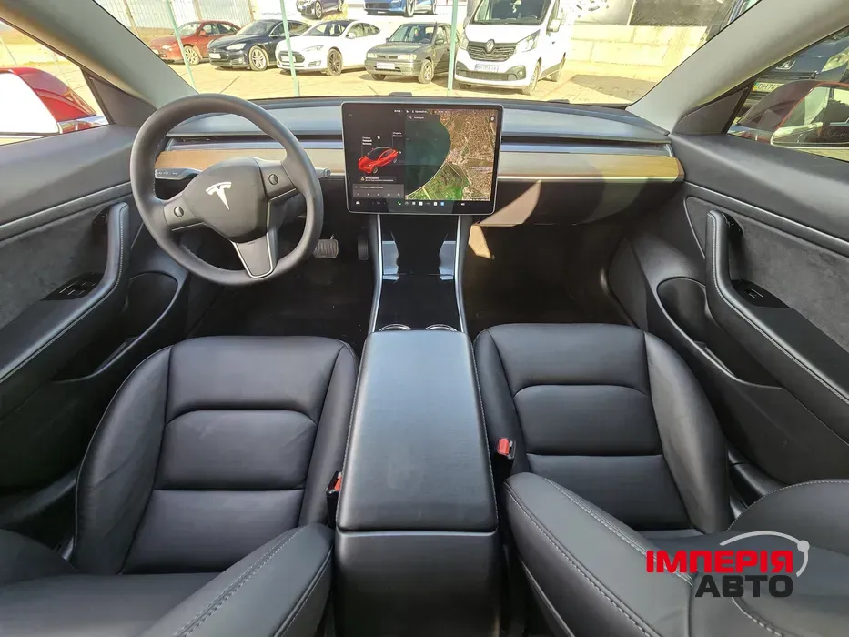 Tesla Model 3 - фото 11