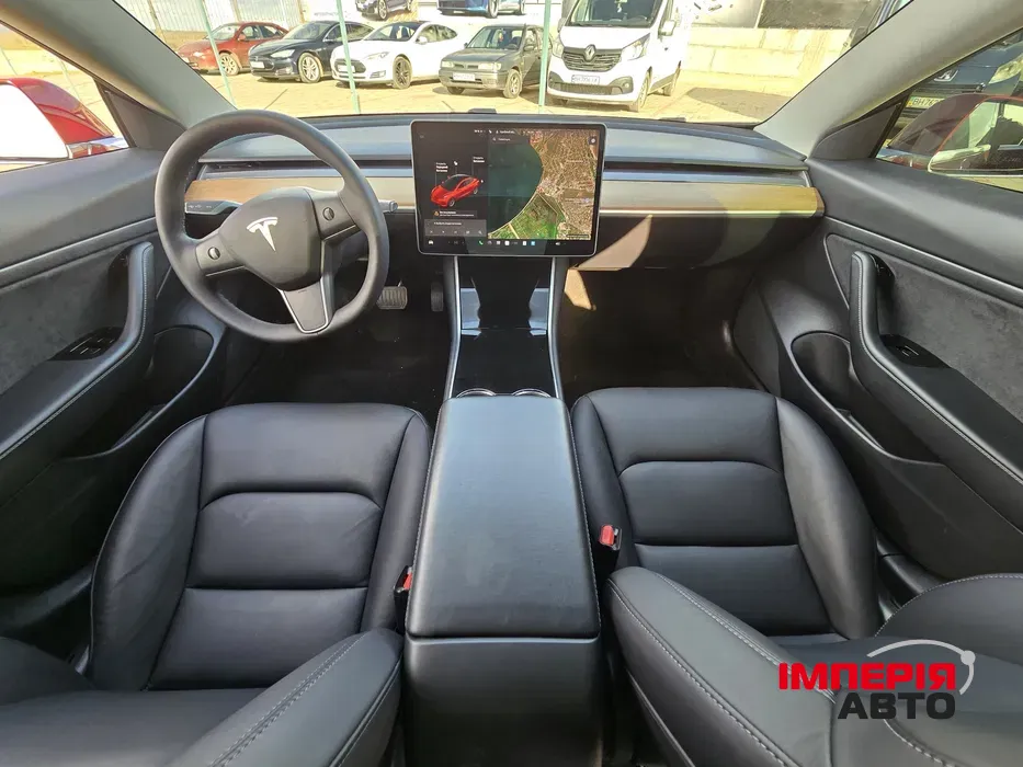 Tesla Model 3 - фото 14