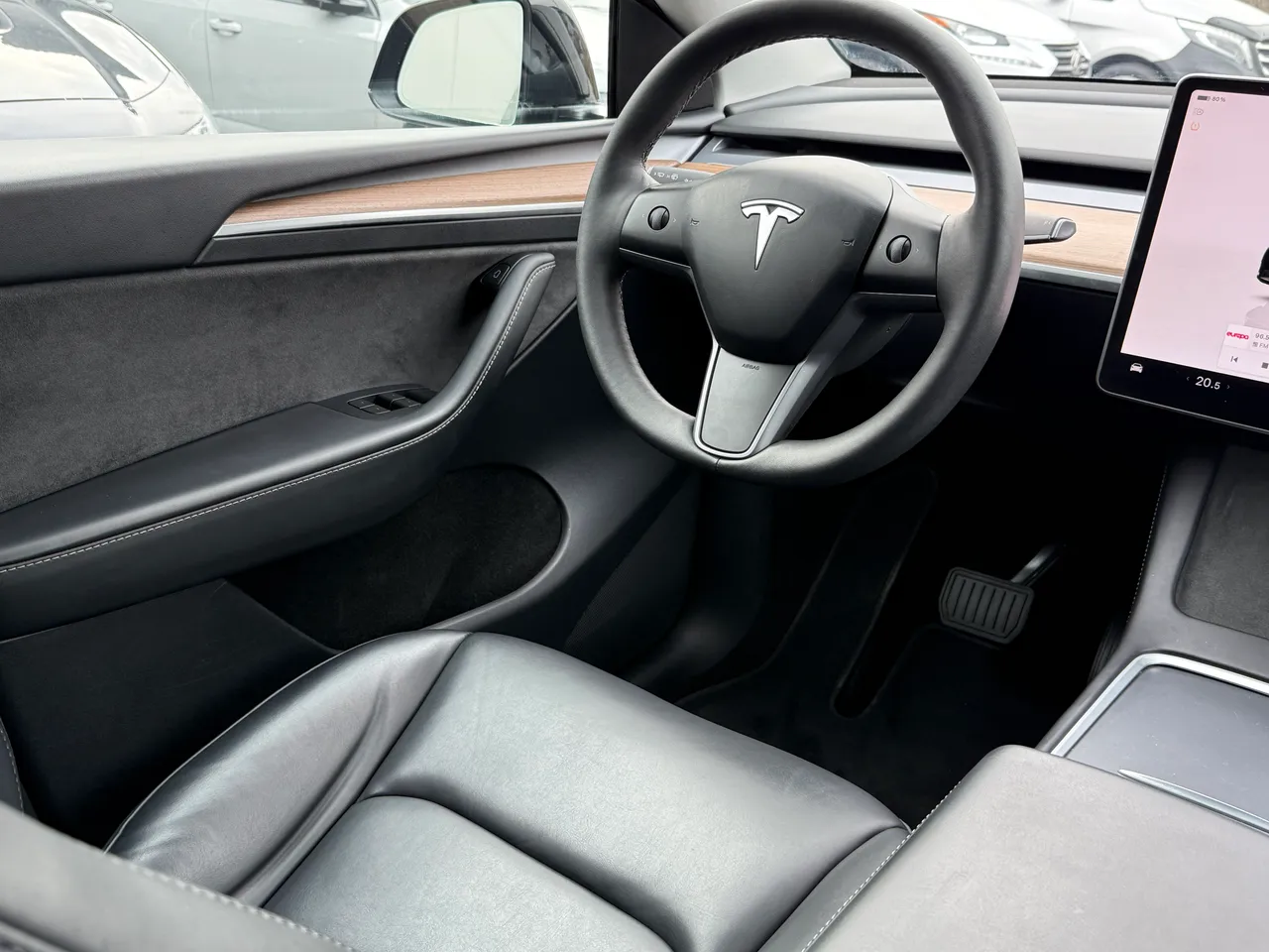 Tesla Model Y - фото 11