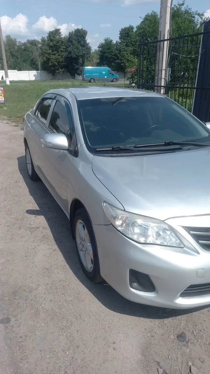 Toyota Corolla - фото 2