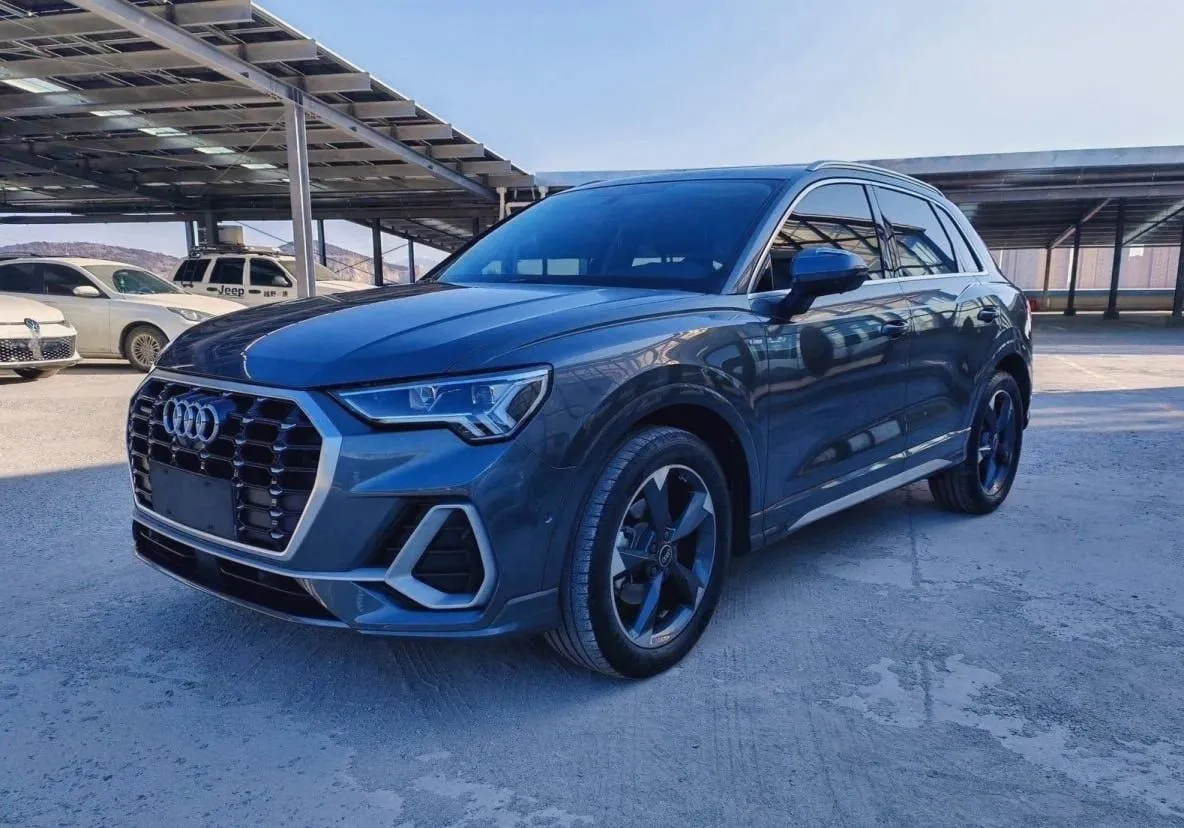 Audi Q3 - фото 1