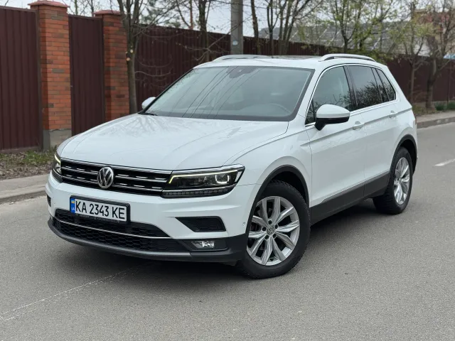 Volkswagen Tiguan - фото 1