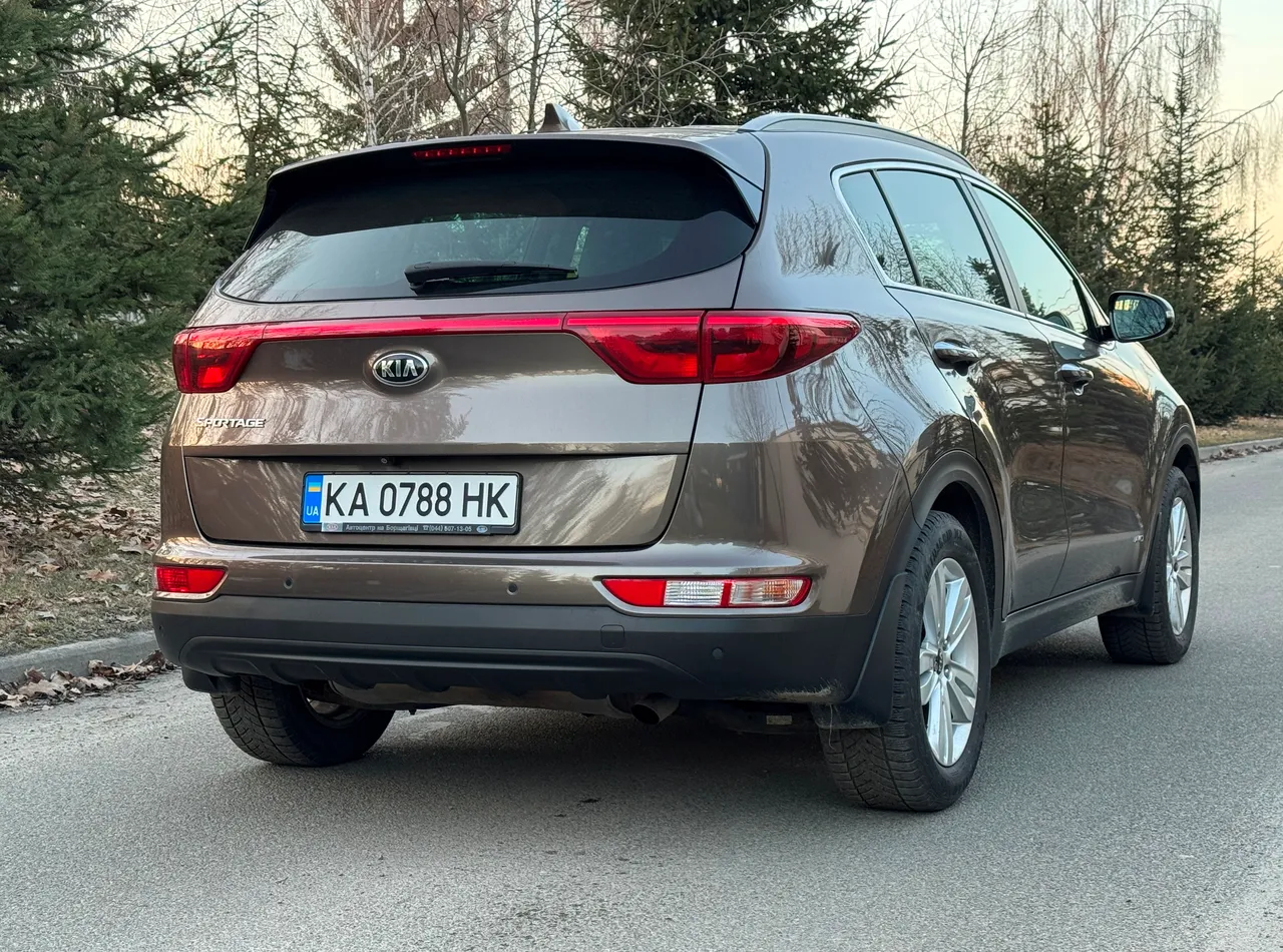 Kia Sportage - фото 13