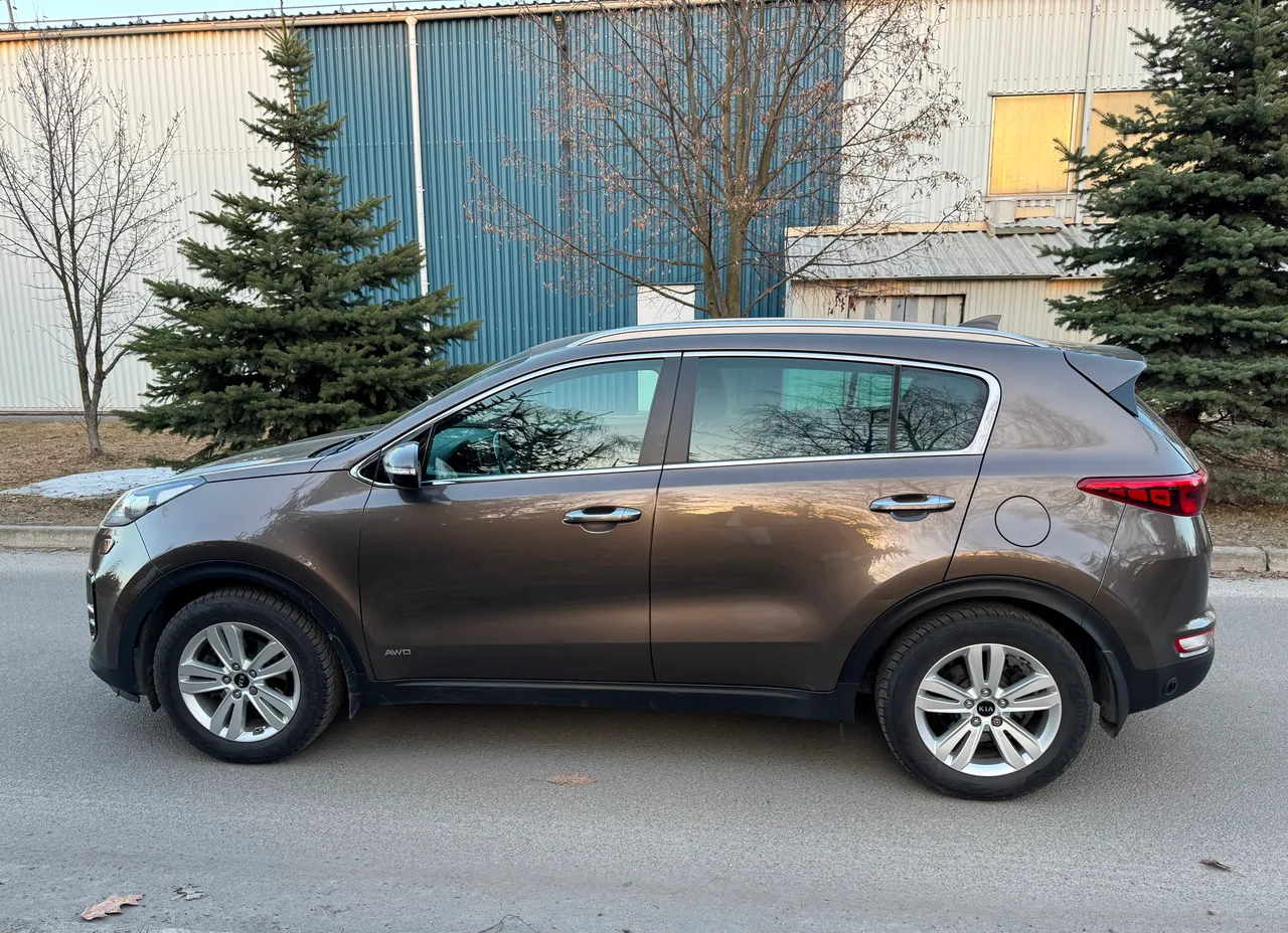 Kia Sportage - фото 19