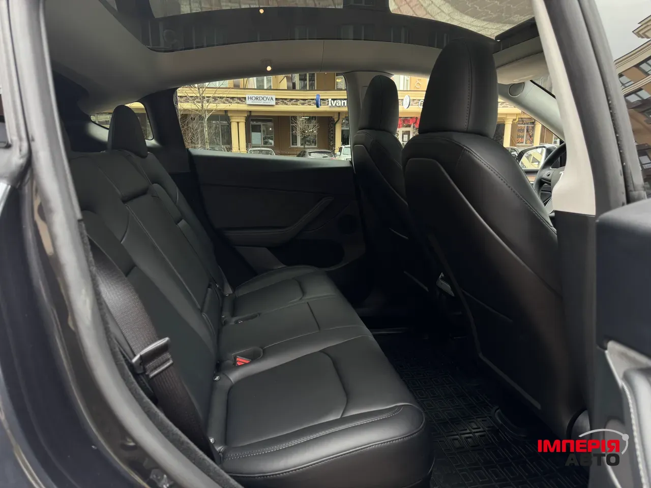 Tesla Model Y - фото 13