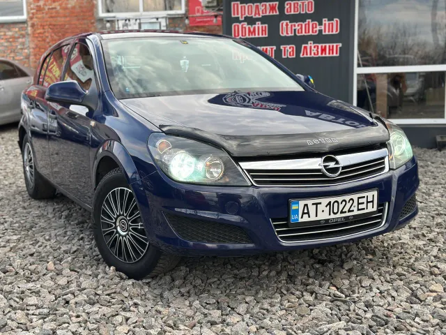 Opel Astra - фото 1
