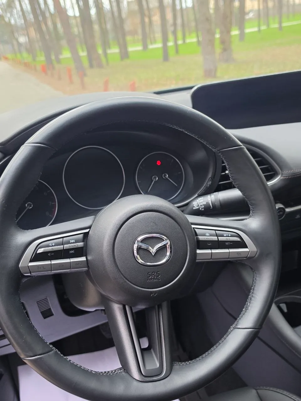 Mazda 3 - фото 7