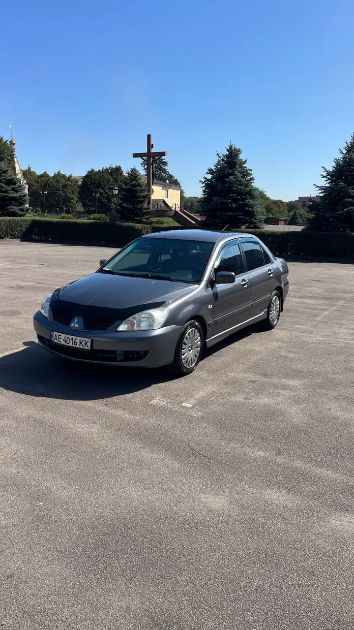 Mitsubishi Lancer - фото 1