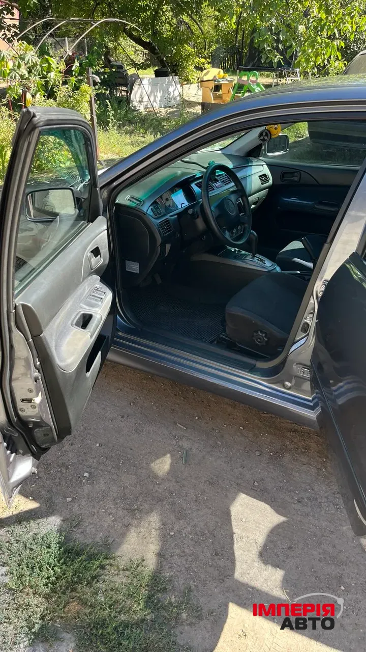 Mitsubishi Lancer - фото 8