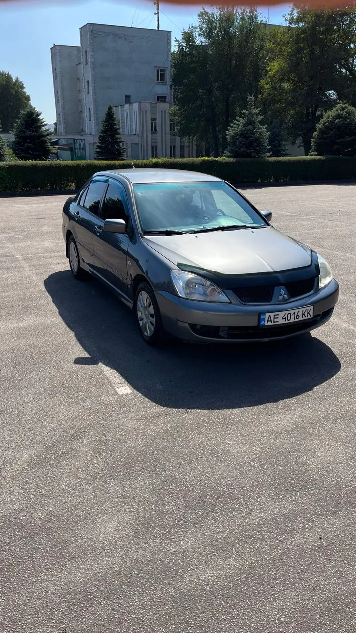 Mitsubishi Lancer - фото 13