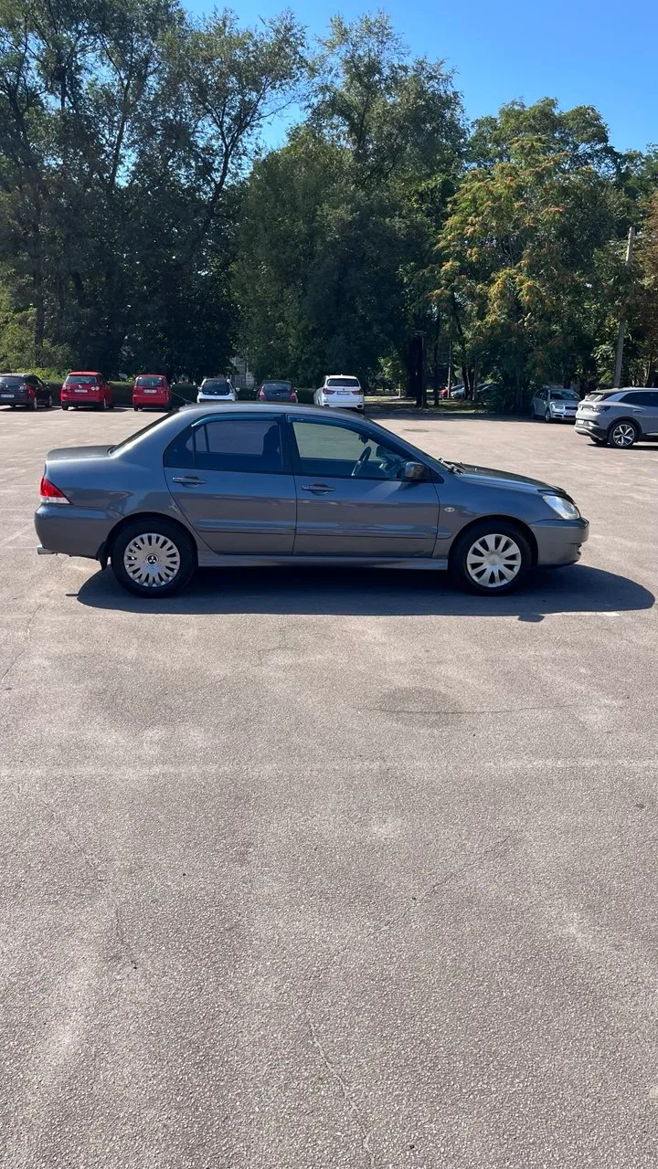 Mitsubishi Lancer - фото 14