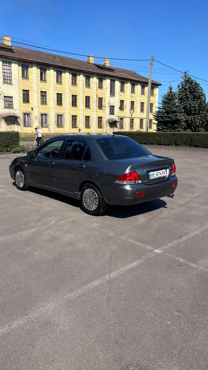 Mitsubishi Lancer - фото 11