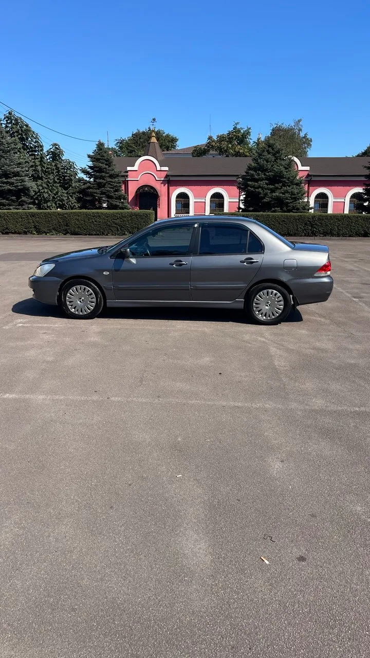 Mitsubishi Lancer - фото 12