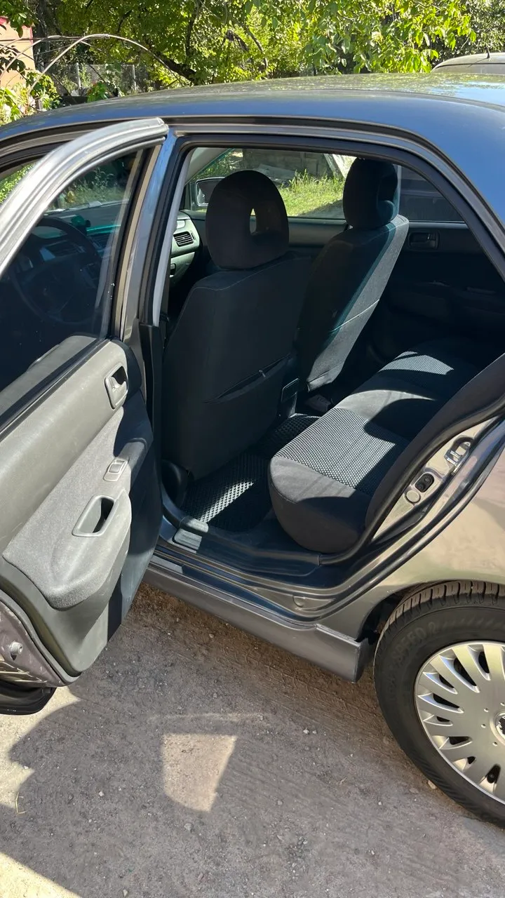 Mitsubishi Lancer - фото 10