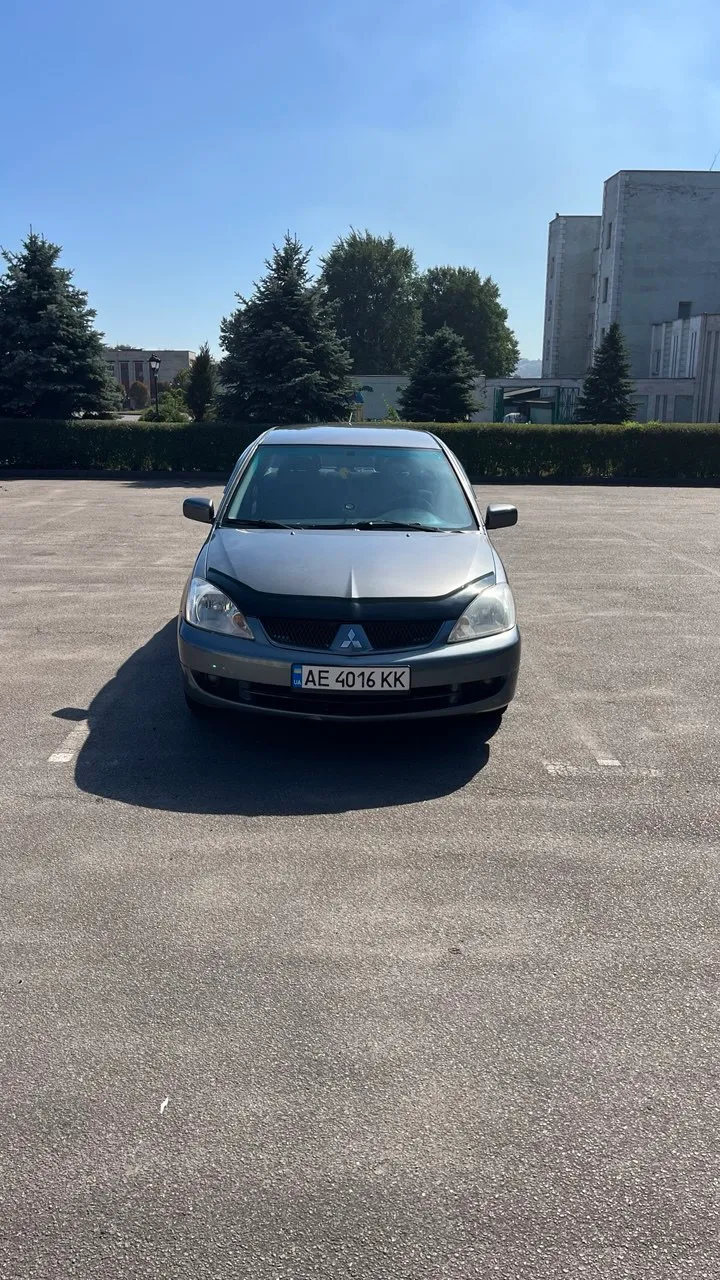 Mitsubishi Lancer - фото 15