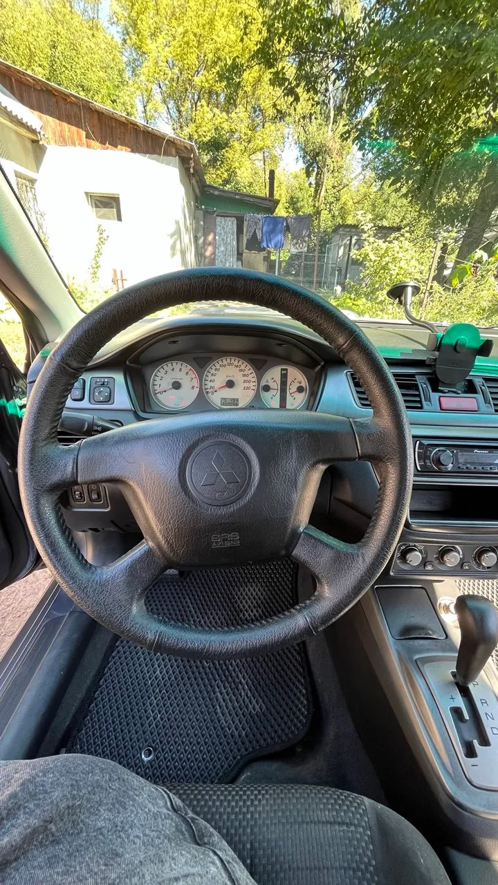 Mitsubishi Lancer - фото 5