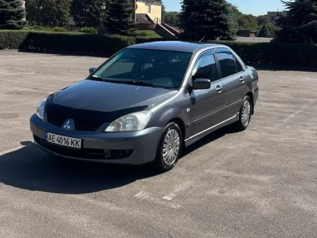 Mitsubishi Lancer - фото 1