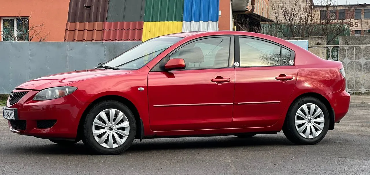 Mazda 3 - фото 6