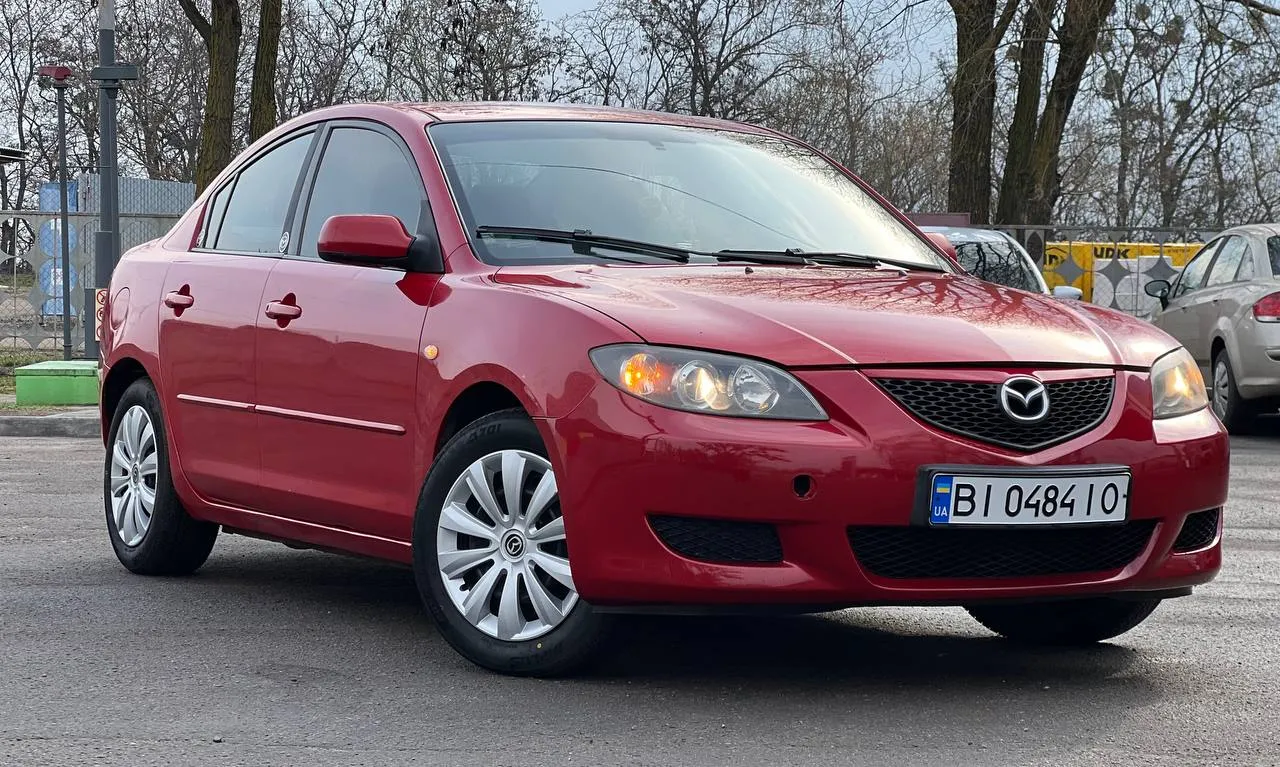 Mazda 3 - фото 1