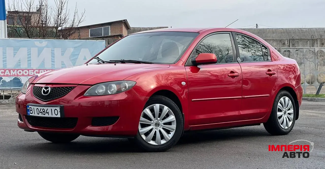 Mazda 3 - фото 8