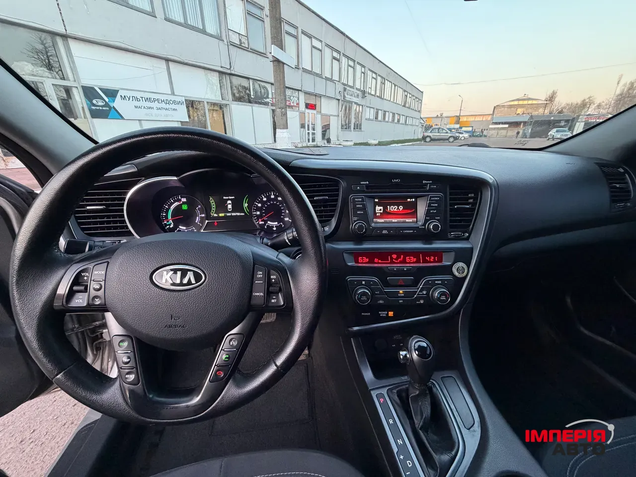 Kia Optima - фото 12