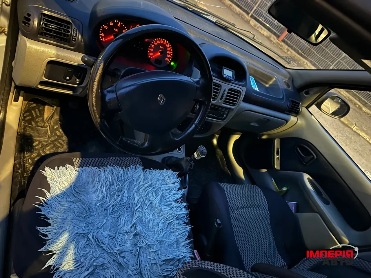 Renault Clio - фото 22