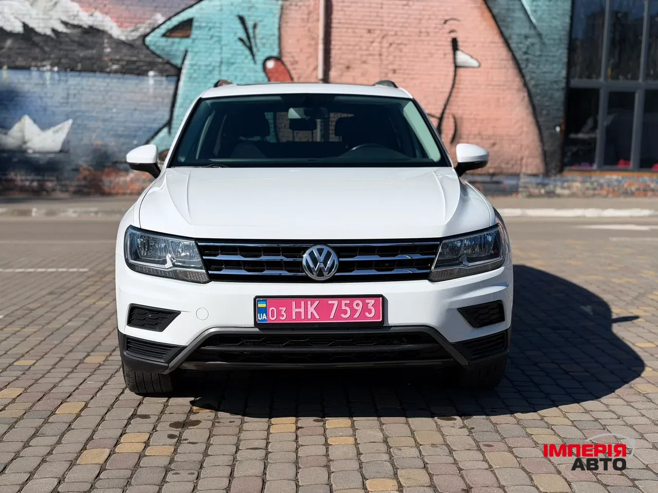 Volkswagen Tiguan - фото 1