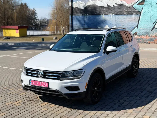 Volkswagen Tiguan - фото 1