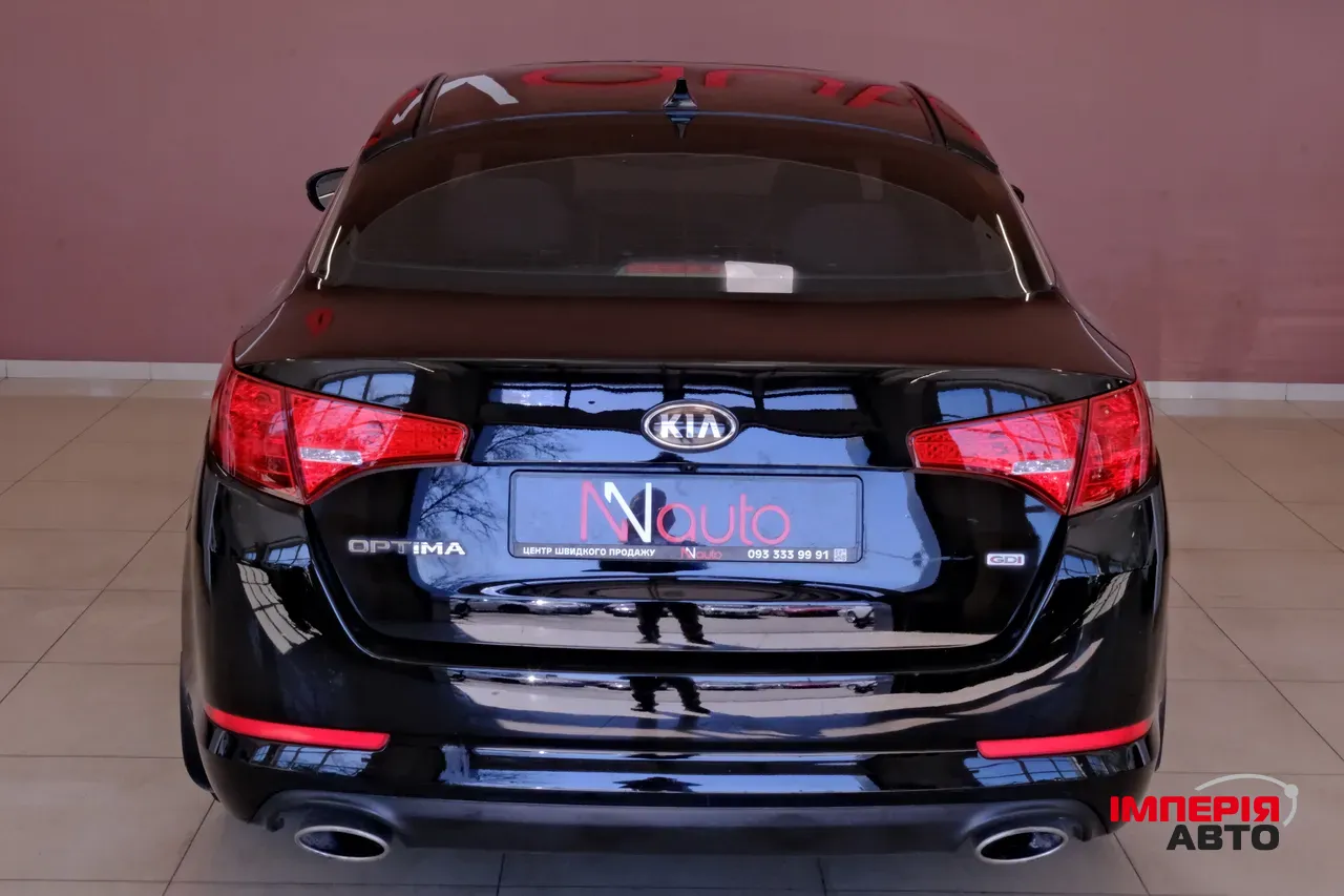 Kia Optima - фото 6