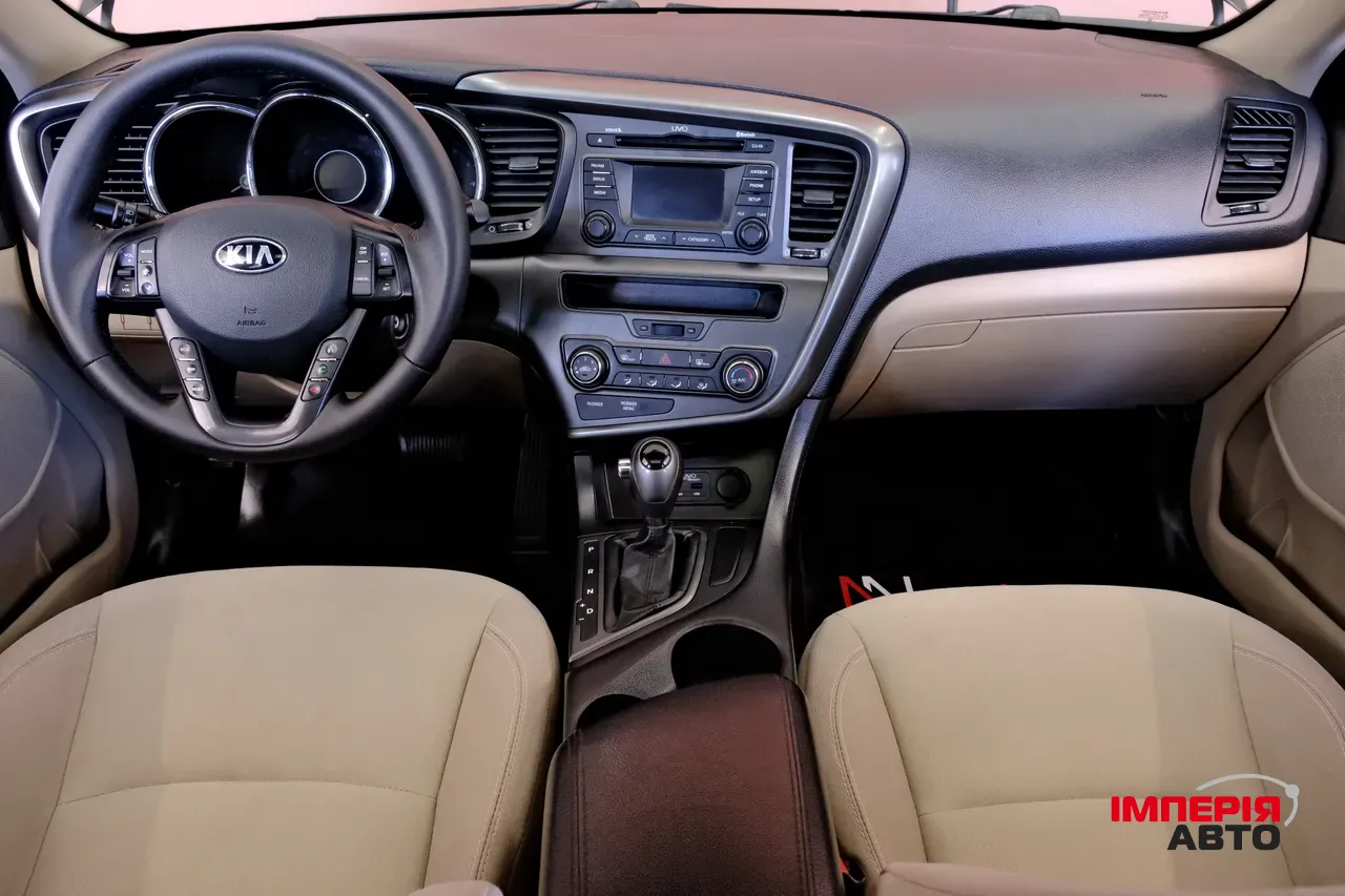 Kia Optima - фото 7